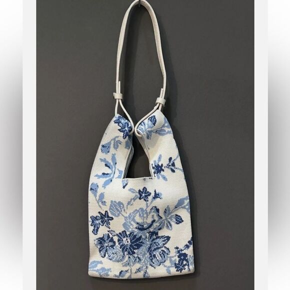 The Lucca Make It Mini Clutch is a knitted bag with a unique unstructured design - Picture 3 of 6